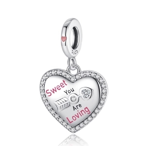 Silver heart charm pendant with 'Sweet You Are Loving' engraving and sparkling zircon border