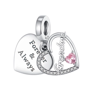 Detail of silver heart charm with Forever & Always engraving and Grandma pink stone