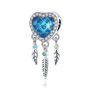 Macro shot of S925 sterling silver heart dreamcatcher charm with blue gem and feathers