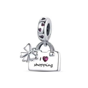 Detailed close-up of S925 silver shopping bag charm with heart gemstones and bow