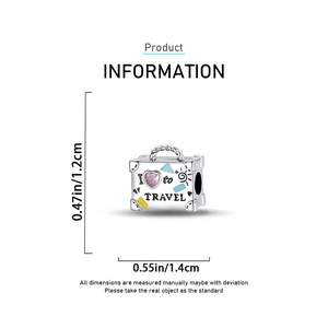 Detailed view of travel suitcase charm with heart stone and size measurements in cm and inch