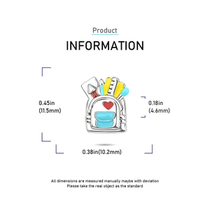 Detailed schoolbag charm with colorful enamel pencils and red heart engraved details