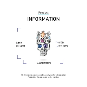 Silver skull charm with colorful zirconia crown and dimensions 1.76cm by 1.02cm