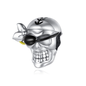 Detailed macro view of pirate skull charm with black enamel eye patch and anchor mark