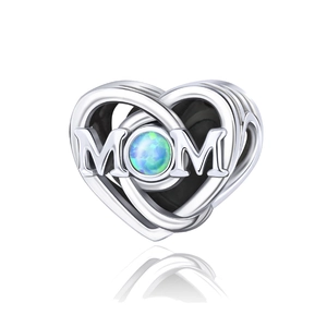 Detailed view of silver heart pendant with blue opal and MOM engraving for mother