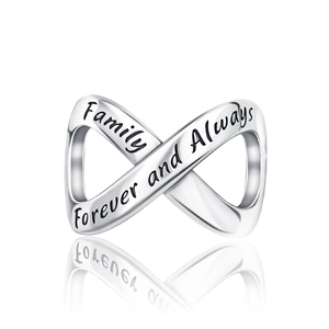 Macro detail of infinity charm engraved with Family and Forever and Always text