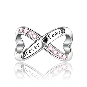 Detail of silver infinity charm featuring Forever Family engraving and pink gemstones