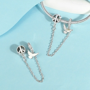 Silberne Friedenstaube und Friedenssymbol-Anhänger mit Zirkonia für Charm-Armbänder