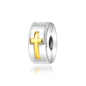 Detail of silver bead charm with golden cross design and openable clip mechanism