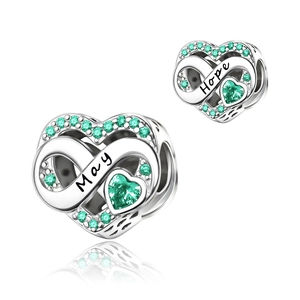 Detail of silver heart charms with infinity symbol, green stones and Hope engraving