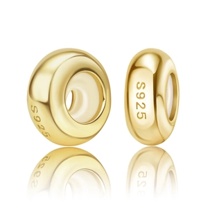 Close-up of golden S925 sterling silver spacer beads with high polished mirror finish