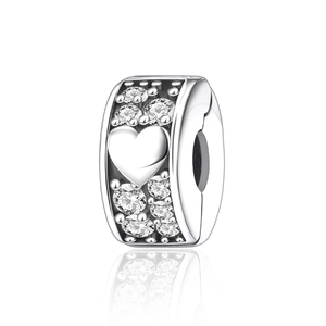 Macro view of heart charm bead with cubic zirconia stones for DIY bracelet jewelry