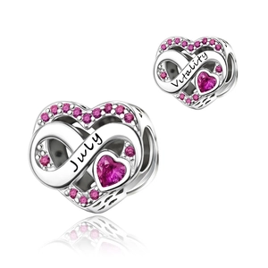 Detailed close-up of heart charm with July pink stone and Vitality engraving