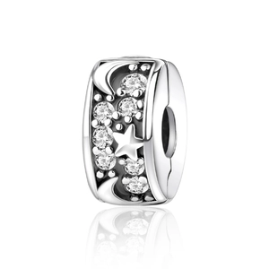 Close-up of silver star and moon charm bead with clear cubic zirconia stones