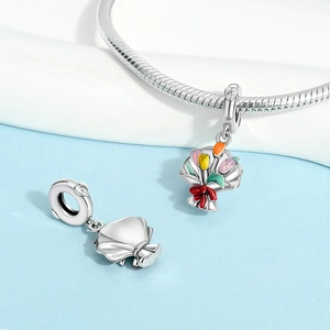 Silver flower bouquet charm with colorful tulip enamel and red bow on a snake chain