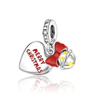 Detail of silver S925 Christmas charm with red Merry Christmas heart and bell