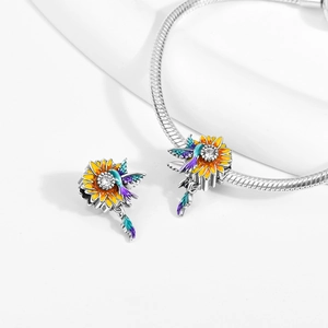 S925 sterling silver sunflower and hummingbird charm with yellow enamel and cubic zirconia