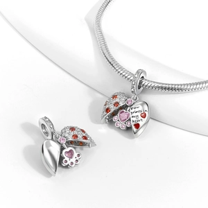 Silver paw print heart pendant with red zircons and Paw prints in my heart engraving