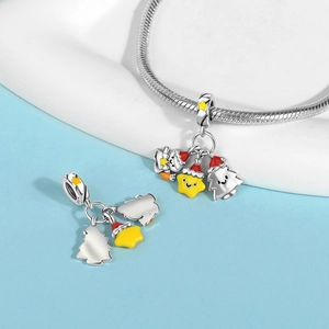 Detailed close-up of S925 sterling silver Christmas charms with enamel finish