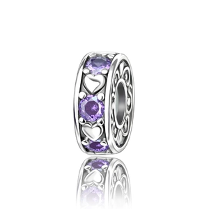 Silver bead charm with purple zircons, heart pattern, and floral hollow-out details