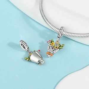 Macro shot of silver bouquet charm with colorful enamel and S925 engraved hallmark