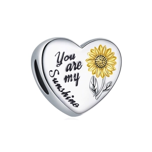 Abalorio de corazón con motivo de girasol y grabado You are my sunshine en plata fina
