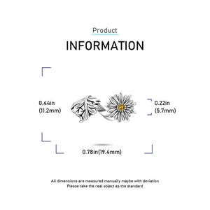 Detailed view of adjustable silver ring with leaf and yellow daisy charms and measurements