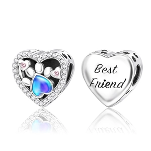 Close-up of S925 silver heart charm with pet paw print and Best Friend engraving
