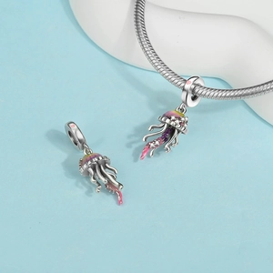 Jellyfish pendant in purple yellow enamel and S925 silver on a snake bone bracelet