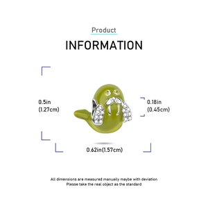 Detail showing dimensions of a green enamel sea lion charm with silver accents