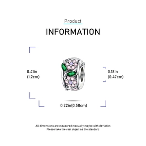 Detailed macro view of S925 silver charm bead with pink green gems and S925 hallmark