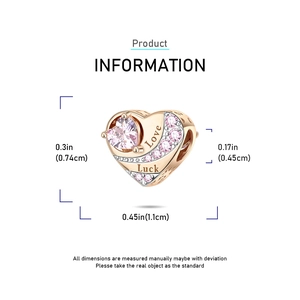 Detailed size view of rose gold heart charm with pink stones and Love Luck engraving