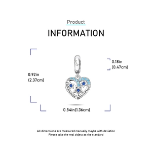 Détail du charm cœur en argent avec étoile incrustée, dimensions 0,92 x 0,54 pouces