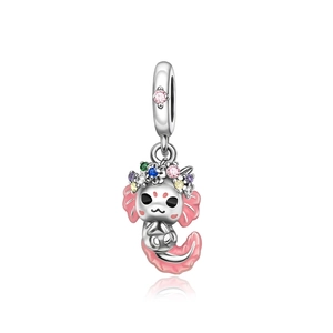 Macro detail of silver axolotl charm with pink enamel and colorful zircon stones