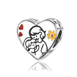 Detailed close-up of heart charm bead with colorful enamel pattern and side cutouts