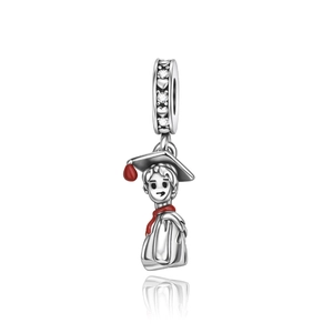 Detailed view of silver graduation pendant with red enamel accents and zircon stones