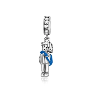 Detail of silver boy pendant with blue enamel scarf and sparkling zircon bale