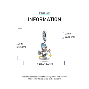 Detailed view of silver skiing snowman charm with dimensions in inches and centimeters