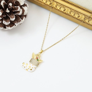 Detail of Christmas stocking pendant with white enamel, gold dots and micro-set zircon crystals