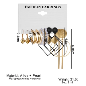 Fashion alloy earring set with gold hoops, pearls, heart charms and black geometric dangles