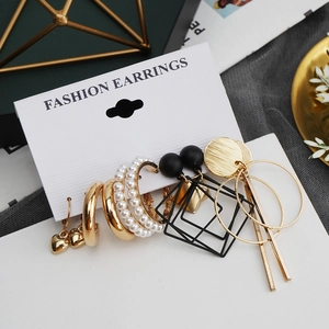 Set of 6 gold-toned geometric earrings with pearls and heart charms on display card