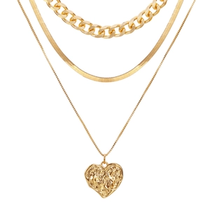 Three-layer gold-plated alloy necklace featuring a chunky curb chain and lava heart pendant