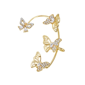 Elegant gold butterfly ear cuff featuring sparkling crystals and a hollow-carved design