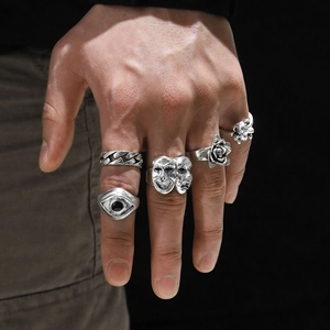 24-piece vintage silver ring set with gothic eye, skull, and rose motifs for men
