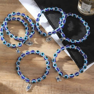 Conjunto de pulseras de cuentas de ojo turco azul con colgantes mano de fátima