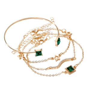 Golden 4-piece bracelet set with emerald green zircon squares and star charms