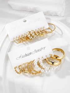 Detailed set of six vintage geometric C-shaped gold alloy earrings with pearls