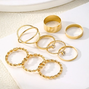9-piece gold twisted and geometric stackable ring set for women in minimalist style