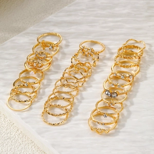 Set of 30 gold bohemian rings with heart, pearl, and wave patterns for women