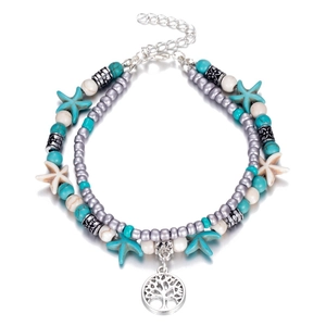 Tobillera bohemia de cuentas turquesas con colgantes de estrella de mar y árbol de vida